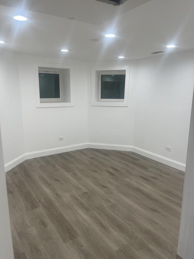6141 S Eberhart Ave, Chicago, IL 60637 - spare room with baseboards, dark wood-type flooring, and recessed lighting
