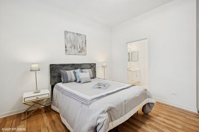 4537 S Drexel Blvd Unit 106, Chicago, IL 60653 - bedroom featuring wood finished floors and ensuite bathroom