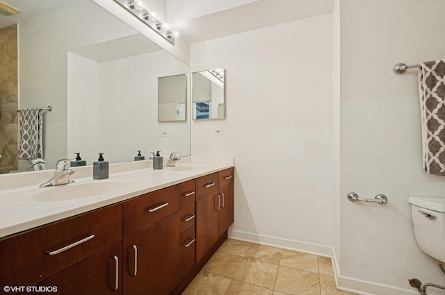 4537 S Drexel Blvd Unit 106, Chicago, IL 60653 - bathroom with double vanity and tile patterned flooring