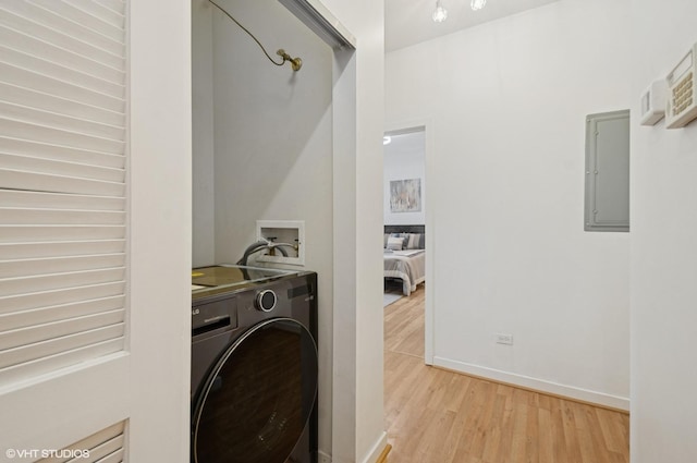 4537 S Drexel Blvd Unit 106, Chicago, IL 60653 - laundry area with washer / clothes dryer, light wood-style floors, and electric panel