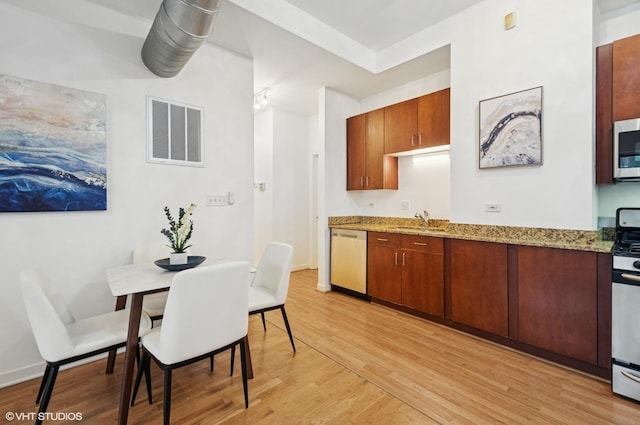 4537 S Drexel Blvd Unit 106, Chicago, IL 60653 - dining space featuring light wood-style flooring and baseboards