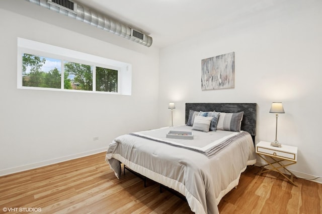 4537 S Drexel Blvd Unit 106, Chicago, IL 60653 - bedroom featuring wood finished floors and baseboards