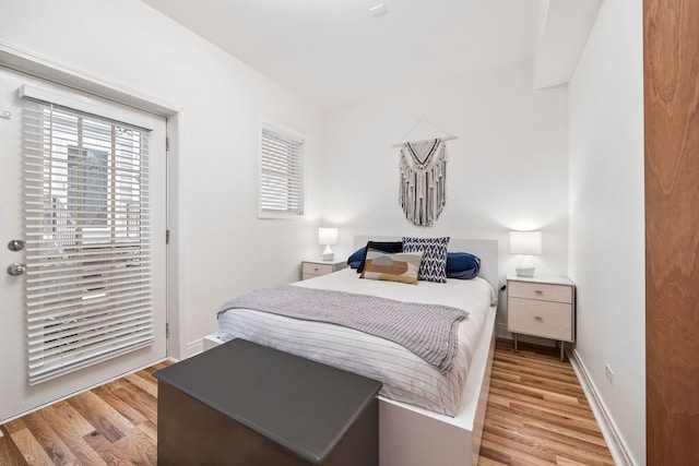 1443 N Mohawk St Unit 1, Chicago, IL 60610 - bedroom with light wood-type flooring and access to outside