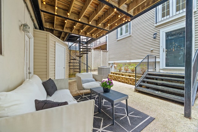 1443 N Mohawk St Unit 1, Chicago, IL 60610 - view of patio featuring stairs and an outdoor hangout area