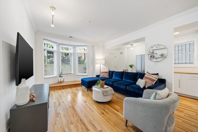 1443 N Mohawk St Unit 1, Chicago, IL 60610 - living room featuring ornamental molding and light wood finished floors