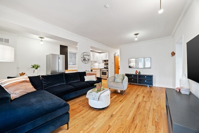 1443 N Mohawk St Unit 1, Chicago, IL 60610 - living room featuring ornamental molding and light wood-style flooring