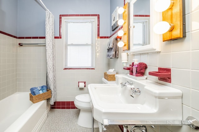 3730 Wenonah Ave, Berwyn, IL 60402 - bathroom featuring tile walls, tile patterned floors, toilet, plenty of natural light, and shower / bath combination with curtain