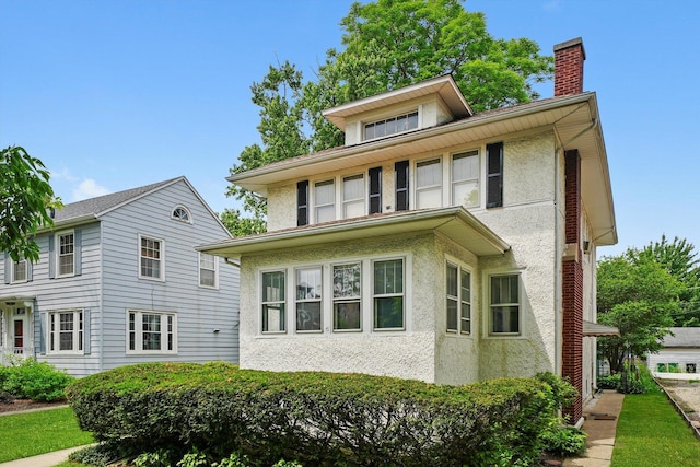 3218 Wenonah Ave, Berwyn, IL 60402 - american foursquare style home with a chimney and stucco siding