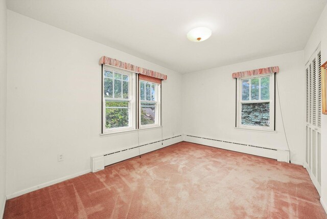 3218 Wenonah Ave, Berwyn, IL 60402 - unfurnished bedroom featuring carpet and a baseboard heating unit