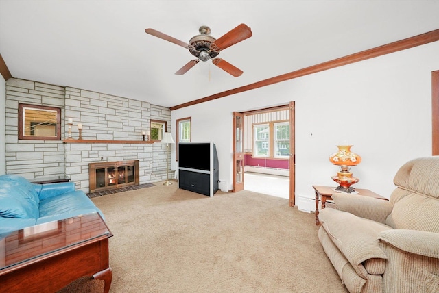 3218 Wenonah Ave, Berwyn, IL 60402 - living area featuring a baseboard heating unit, ceiling fan, a stone fireplace, ornamental molding, and carpet floors
