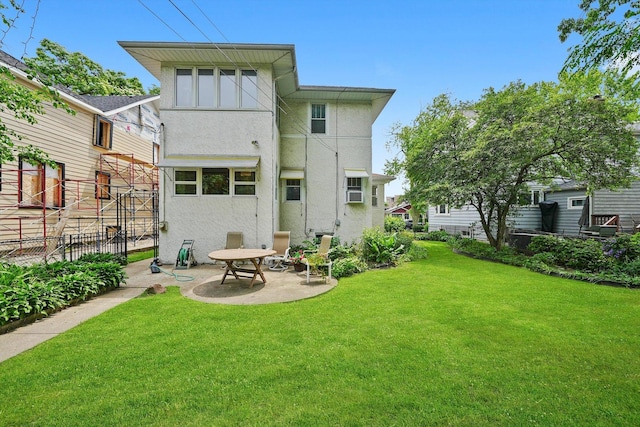 3218 Wenonah Ave, Berwyn, IL 60402 - rear view of property with stucco siding and a patio area