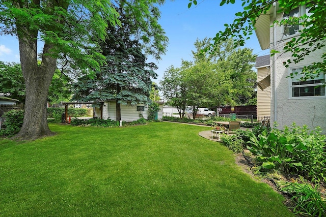 3218 Wenonah Ave, Berwyn, IL 60402 - view of yard featuring an outdoor structure and a patio