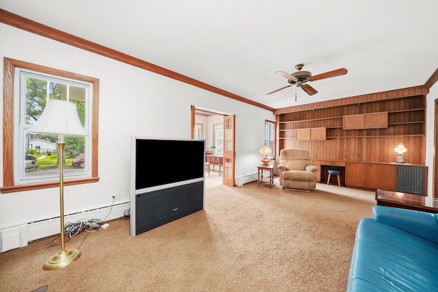 3218 Wenonah Ave, Berwyn, IL 60402 - carpeted living room with baseboard heating, ceiling fan, built in shelves, and ornamental molding