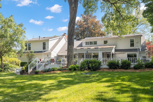 948A Shetland Dr, Frankfort, IL 60423 - back of property with a deck, a yard, and a chimney