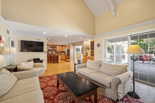948A Shetland Dr, Frankfort, IL 60423 - living room featuring light wood-style floors, plenty of natural light, vaulted ceiling, recessed lighting, and ornamental molding