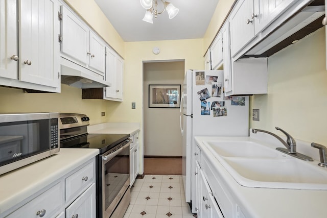 948A Shetland Dr, Frankfort, IL 60423 - kitchen featuring stainless steel appliances, under cabinet range hood, light countertops, and white cabinets
