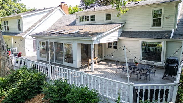 948A Shetland Dr, Frankfort, IL 60423 - back of house featuring outdoor dining area, a shingled roof, and a deck