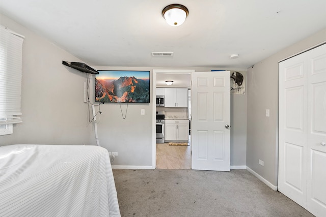 417 Dellwood Ave, Lockport, IL 60441 - bedroom featuring light carpet and a closet