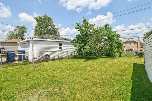 1127 Herbert Ave, Berkeley, IL 60163 - view of yard featuring a detached garage and an outbuilding