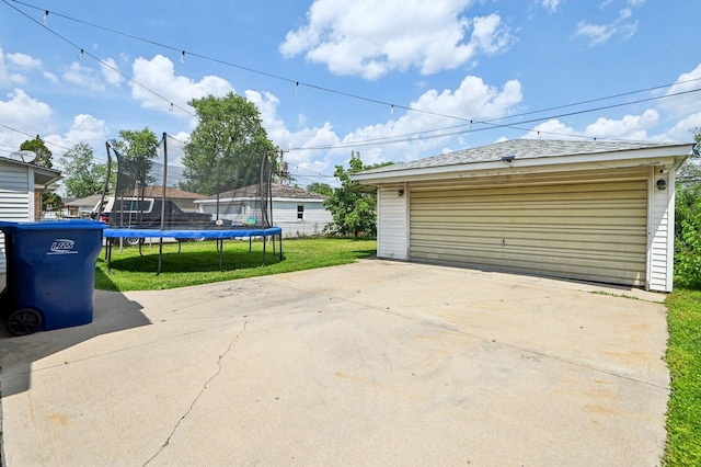 1127 Herbert Ave, Berkeley, IL 60163 - detached garage featuring a trampoline