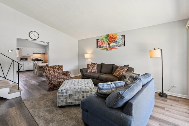 1127 Herbert Ave, Berkeley, IL 60163 - living room with stairs, wood finished floors, and lofted ceiling