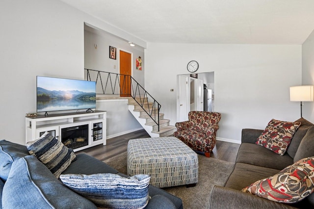 1127 Herbert Ave, Berkeley, IL 60163 - living room featuring lofted ceiling, wood finished floors, and stairs
