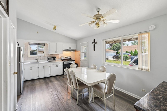 1127 Herbert Ave, Berkeley, IL 60163 - dining room with vaulted ceiling, dark wood-style flooring, and a ceiling fan