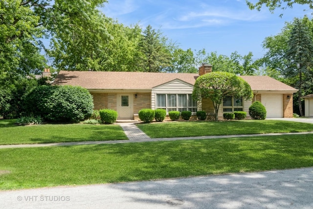2601 Gordon Dr, Flossmoor, IL 60422 - ranch-style home with an attached garage, a front lawn, brick siding, and a chimney