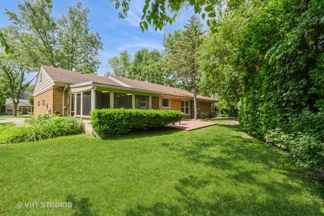 2601 Gordon Dr, Flossmoor, IL 60422 - back of property with a yard and brick siding