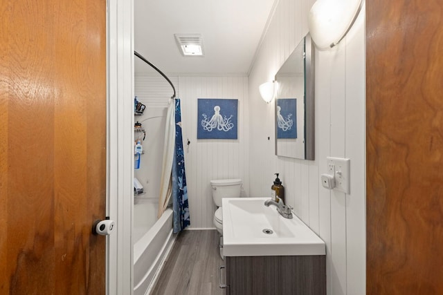 1907 S St, Geneva, IL 60134 - full bathroom featuring wood finished floors, vanity, and shower / bathtub combination with curtain