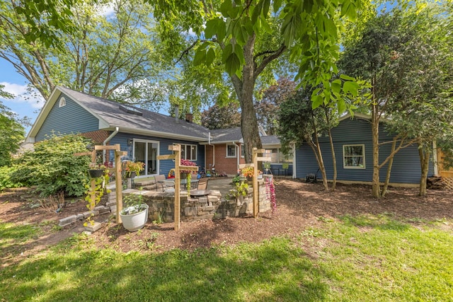 1907 S St, Geneva, IL 60134 - back of property featuring a patio and brick siding
