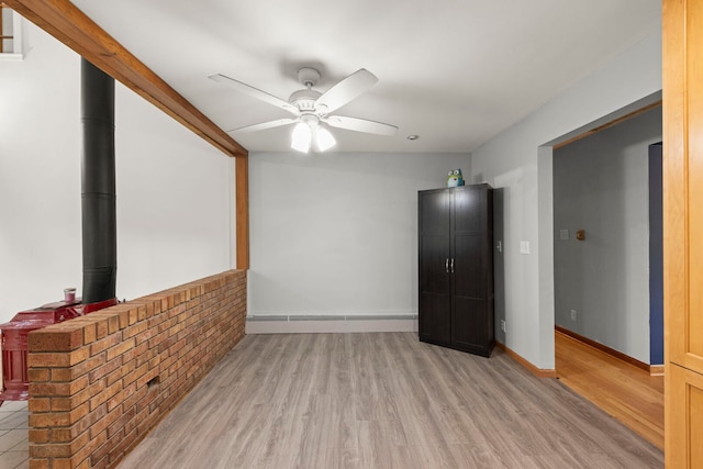 1907 S St, Geneva, IL 60134 - unfurnished living room featuring ceiling fan and light wood-style flooring