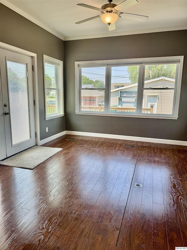 732 S 13th, Quincy, IL 62301 - unfurnished room with wood-type flooring, crown molding, a ceiling fan, and baseboards