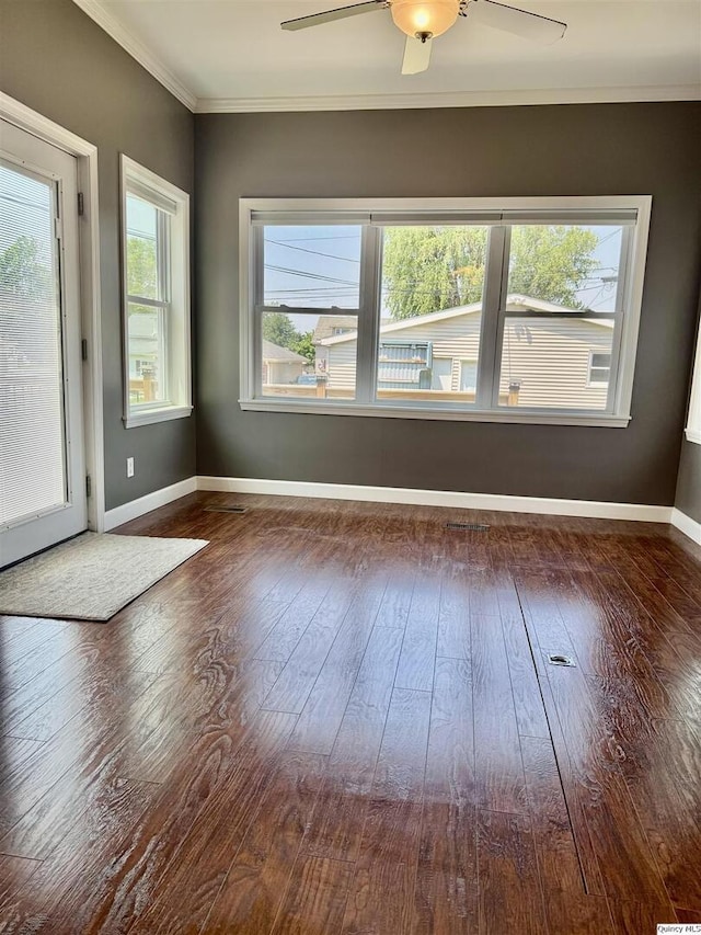 732 S 13th, Quincy, IL 62301 - spare room featuring wood-type flooring, crown molding, ceiling fan, and baseboards