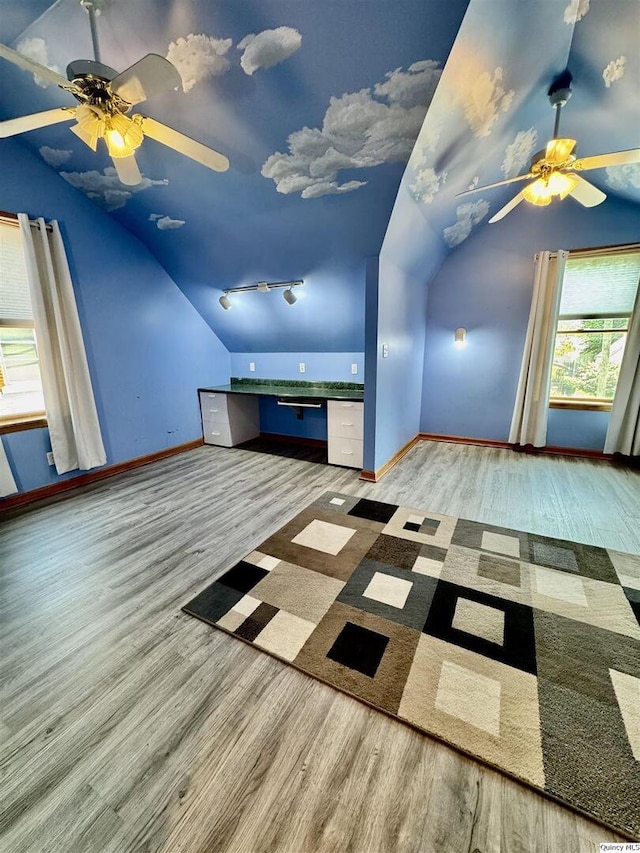 732 S 13th, Quincy, IL 62301 - additional living space featuring lofted ceiling, a ceiling fan, wood finished floors, and baseboards
