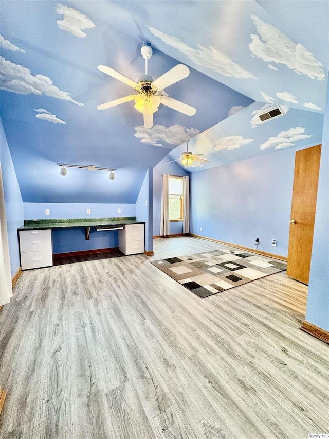 732 S 13th, Quincy, IL 62301 - bonus room with lofted ceiling, wood finished floors, baseboards, and ceiling fan