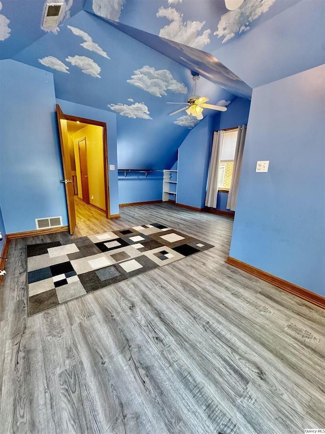 732 S 13th, Quincy, IL 62301 - bonus room featuring vaulted ceiling, wood finished floors, baseboards, and ceiling fan