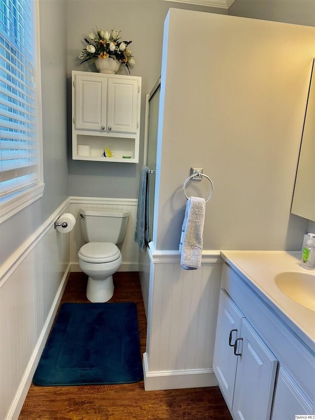 732 S 13th, Quincy, IL 62301 - full bath with wainscoting, vanity, toilet, and wood finished floors