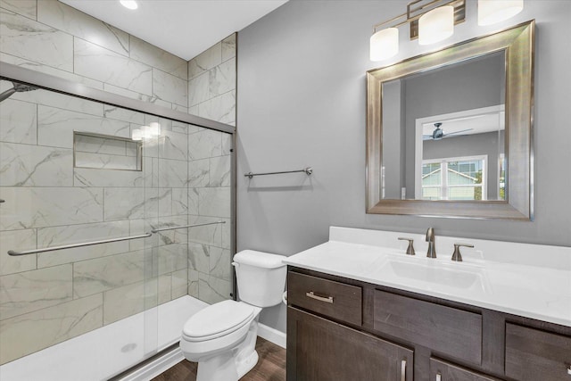 3311 Memory Ln, Urbana, IL 61802 - bathroom featuring vanity, wood finished floors, toilet, and a shower stall