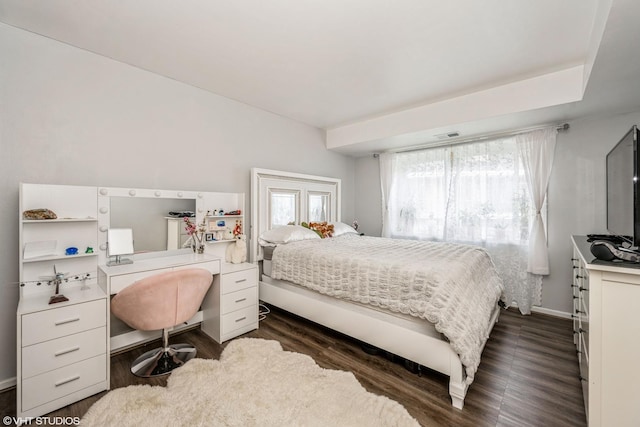 9529 Bronx Pl Unit 209, Skokie, IL 60077 - bedroom featuring dark wood-type flooring and a desk