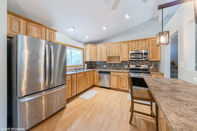 2510 Timber Ln, Lindenhurst, IL 60046 - kitchen with stainless steel appliances, lofted ceiling, light brown cabinets, decorative backsplash, and light wood-style floors