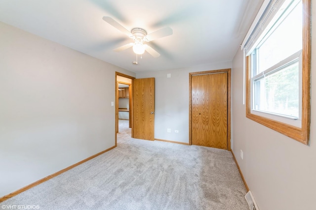 2510 Timber Ln, Lindenhurst, IL 60046 - unfurnished bedroom with a closet, carpet, and ceiling fan
