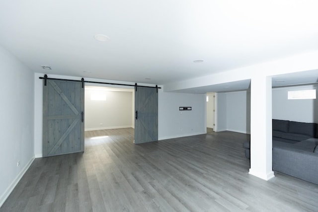 3145 Hillside Ln, Darien, IL 60561 - basement featuring a barn door and light wood finished floors