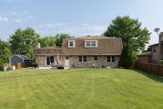 3145 Hillside Ln, Darien, IL 60561 - back of property featuring a fenced backyard, a patio, a shingled roof, and a chimney