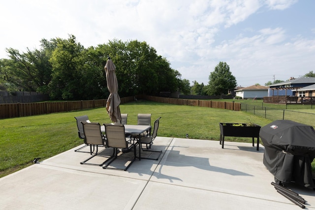 3145 Hillside Ln, Darien, IL 60561 - fenced backyard with area for grilling, outdoor dining area, and a patio