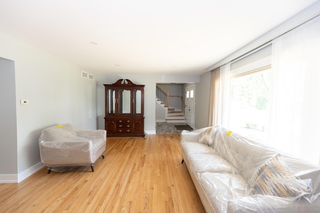 3145 Hillside Ln, Darien, IL 60561 - living room with stairway and light wood-style flooring