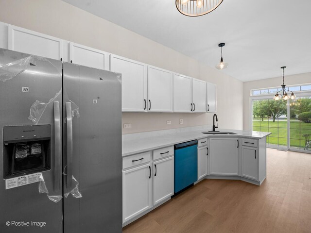 18506 Bellagio Cir, Tinley Park, IL 60477 - kitchen with stainless steel fridge, dishwashing machine, light wood finished floors, white cabinets, and a peninsula