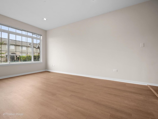 18506 Bellagio Cir, Tinley Park, IL 60477 - spare room featuring wood finished floors and recessed lighting