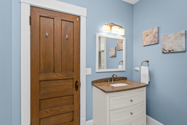 4039 N Kildare Ave, Chicago, IL 60641 - bathroom with vanity and baseboards