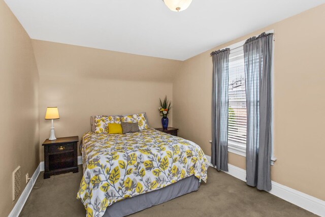 4039 N Kildare Ave, Chicago, IL 60641 - carpeted bedroom featuring baseboards and lofted ceiling